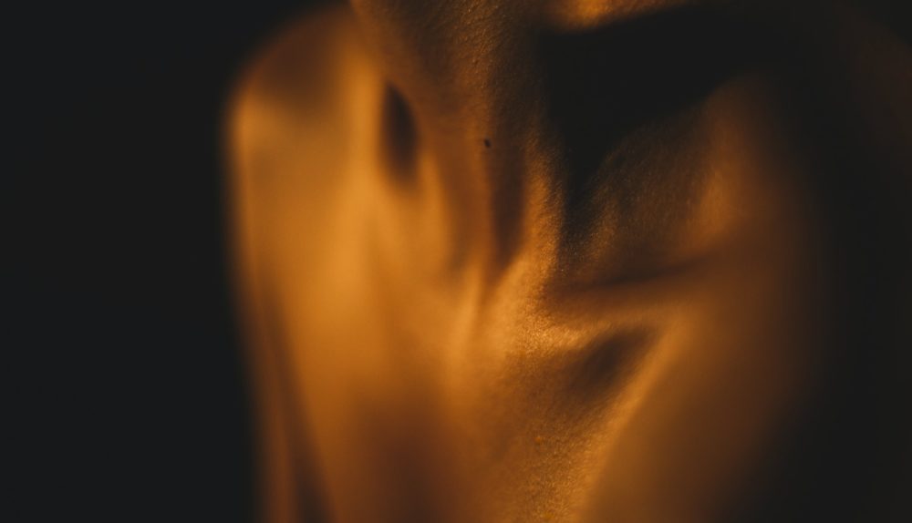 a blurry photo of a person's torso